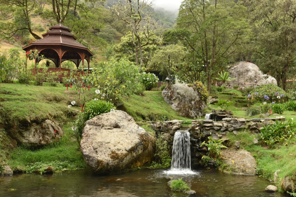 Gazebo, pond and gardens at Trogón Lodge in San Gerardo de Dota, Costa Rica.