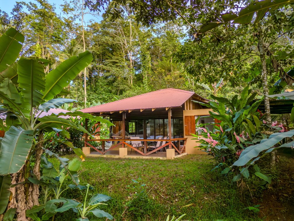 Bungalow and tropical gardens at Boca Tapada Lodge, Costa Rica.