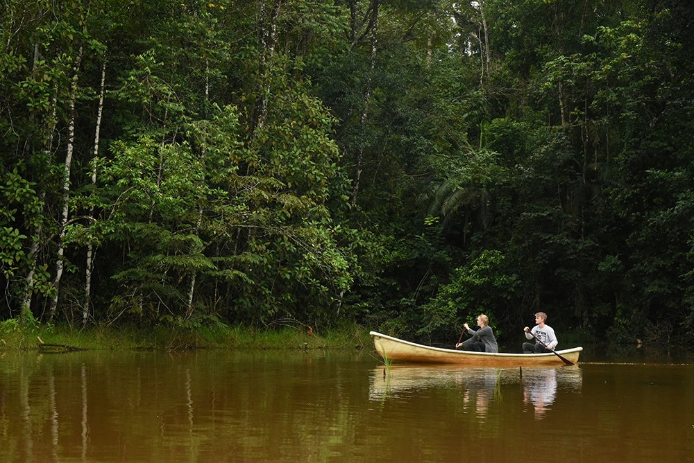 Boca Tapada Photography: Lodges, Wildlife & Local Guides 1 Canoe on a forest-bordered lagoon at Laguna del Lagarto Lodge, Boca Tapada.